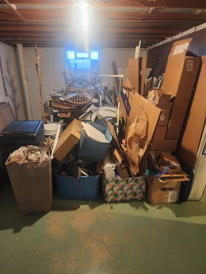 Roll-off dumpster container at job site for 4 Yard Dumpster Rental in Hampshire